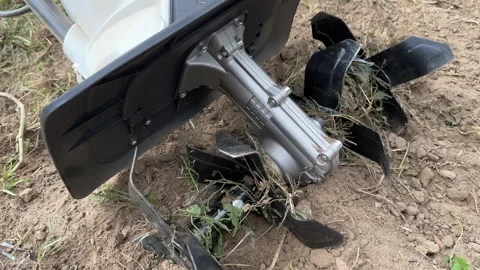 Electric Tiller in Action: Preparing Soil for Vegetables Video stock 278151211