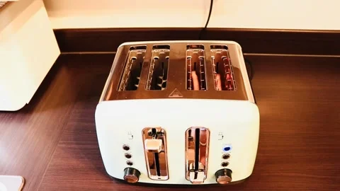 Electric toaster bread cooked between heated element 库存影片 139756261