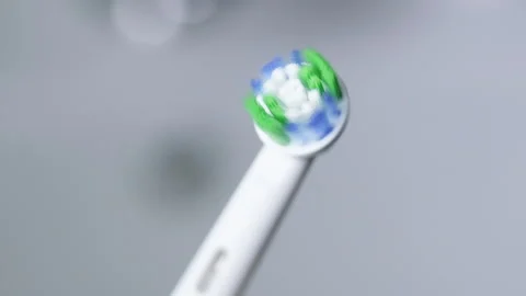 Electric toothbrush in bathroom Stock Footage 204000604