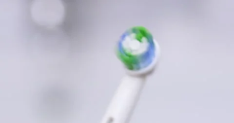 Electric toothbrush in bathroom Stock Footage 209185199