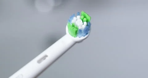Electric toothbrush in bathroom Stock Footage 230623920