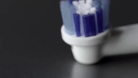 Electric Toothbrush head extreme close up UHD stock footage. Stock Footage 77763493