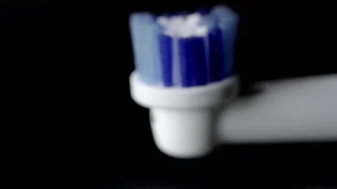 Electric Toothbrush head extreme close up UHD stock footage. Stock Footage 77763786