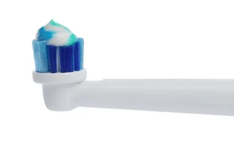 Electric toothbrush with paste on white background, closeup 스톡 사진