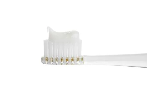 Electric toothbrush with paste on white background, closeup 스톡 사진