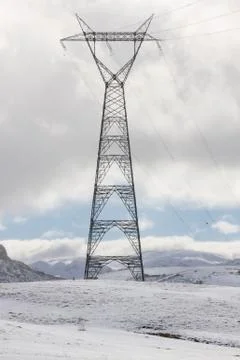 Electric tower in the snow 스톡 사진