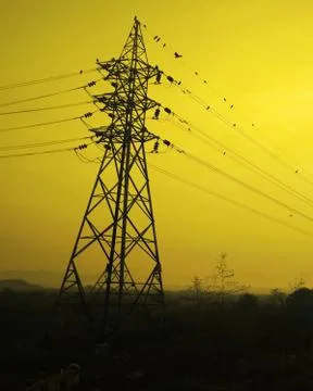 Electric tower with yellow background. Stock Photos