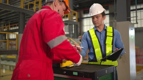 Electric train engineer and technician using repair tools Stock Footage 253787478