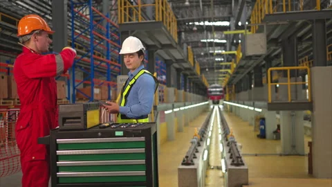 Electric train engineer and technician using repair tools Video stock 253787521