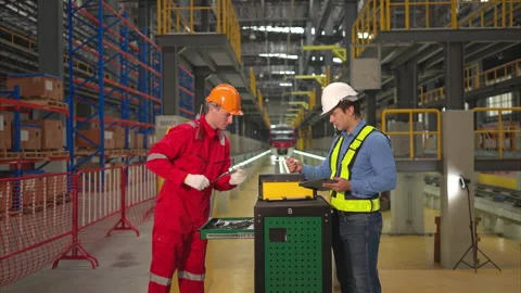 Electric train engineer and technician using repair tools Stock Footage 253794830
