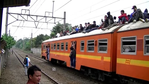 Electric train on the Jakarta 2010 Stock Footage 301757406