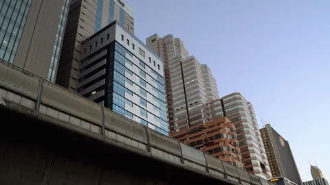 Electric train in monorail system, raised above the ground in Bangkok Stock Footage 124435112