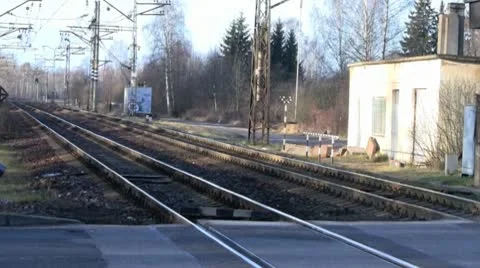 An electric train moves slowly along the tracks on a cool early morning Stock Footage 10584472