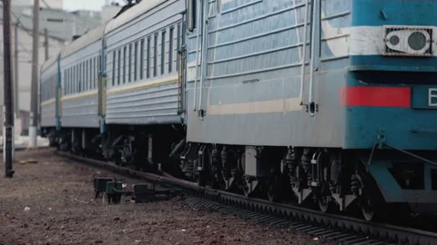 Electric train moving by rail. Outdated design. Soviet electric train traveling 库存影片 169419852