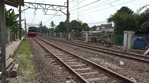 The electric train is moving towards the station Stock Footage 157012724