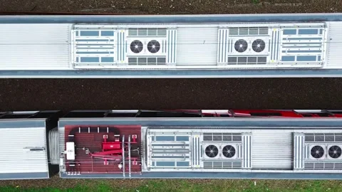 Electric Train Passing on Railway Tracks with Overhead Power Lines Stock Footage 315083953