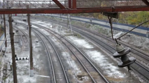 Electric train wires with rails under the first snow Video stock 55628600