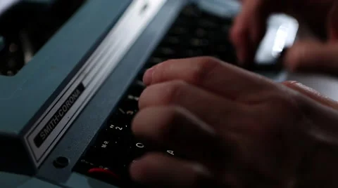 Electric typewriter hands typing jib down defocus 2 Stock Footage 47461749
