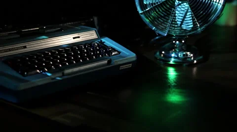 Electric typewriter on writing desk projected typing jib 1 Stock Footage 47460734