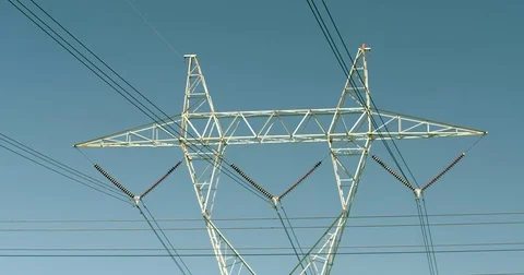 Electric utility tower with high voltage power lines power grid Stock Footage 74676404