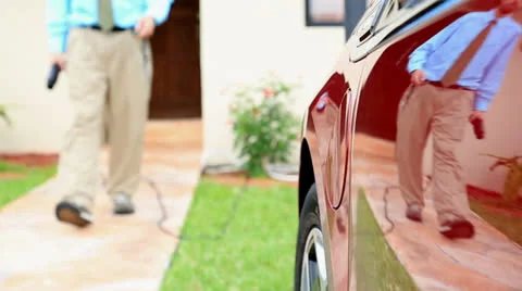 Electric vehicle being plugged in Stock-Footage 24466030