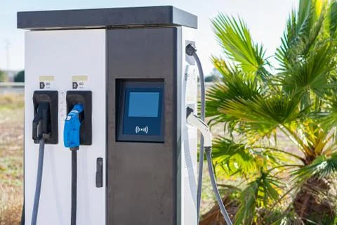 Electric vehicle charging point. Stock Photos