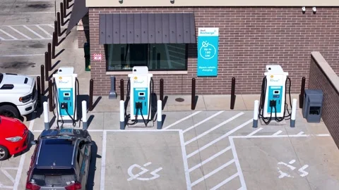Electric vehicle charging station at Shell gas station, Elyria, Ohio, USA in Stock Footage 325381489