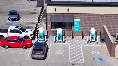 Electric vehicle charging station at Shell gas station, Elyria, Ohio Stock Footage 328228177