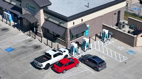 Electric vehicle charging stations at Shell gas station in Elyria, Ohio, USA Stock Footage 325960462