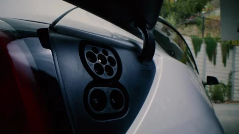 Electric Vehicle, Ev, Ev Charging, Plugging In Stock Footage 327947460