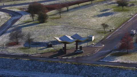 Electric vehicle loading station hub along the highway. Sustainable energy Stock Footage 322007109