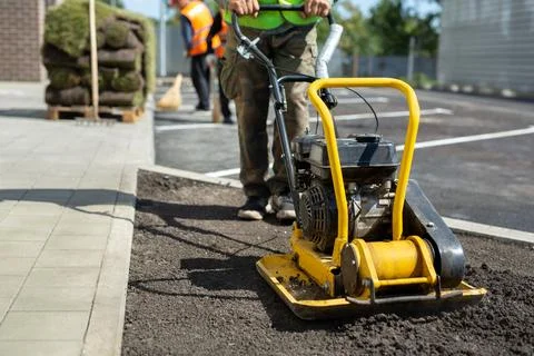 Electric vibrating roller, a machine for tamping the ground before planting a Stock Photos