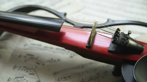 Electric violin bridge. Musical notes background. Panorama Stock Footage 65417321