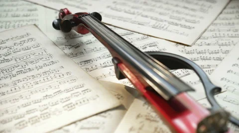 Electric violin with musical notes. Romantic uplifting motivational Stock Footage 65419149