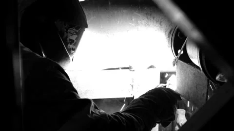 Electric welder performs work on welding a water pipe Stock Footage 249526227