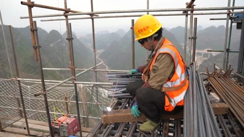 An electric welder working at the construction site  in China Stock-Footage 270219083