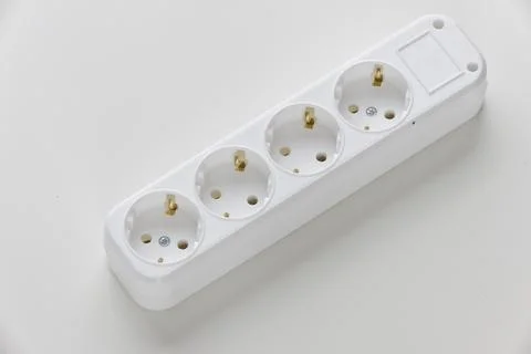 Electric white portable socket on white background Stock Photos
