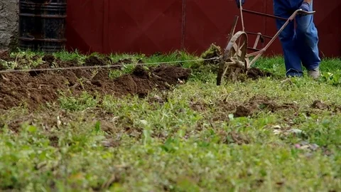 Electric winch and hand plow for plowing Stock Footage 70054429
