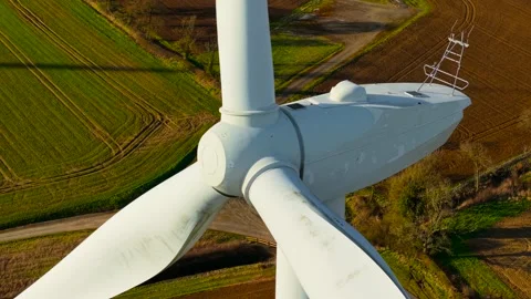Electric windmill spinning and producing eco energy. Wind turbine working Stock Footage 313880768