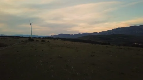 Electric windmill at sunrise Stock Footage 108396225