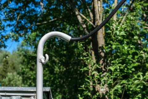 The electric wire is connected to the house. Stock Photos