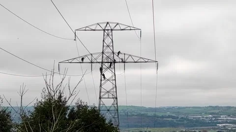 Electric Workers on a pylon 2 Video stock 257828807