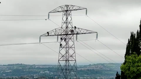 Electric Workers on a pylon Video stock 257831493