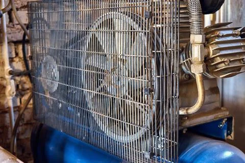 Electrical air compressor in workshop closeup view Stock Photos
