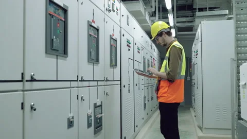 Electrical and Instrument technician checking electrical control board Stock Footage 158626860