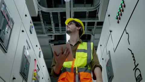 Electrical and Instrument technician checking electrical control board Stock Footage 162958946