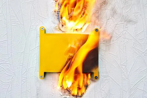 An electrical box that caught on fire. Stock Photos
