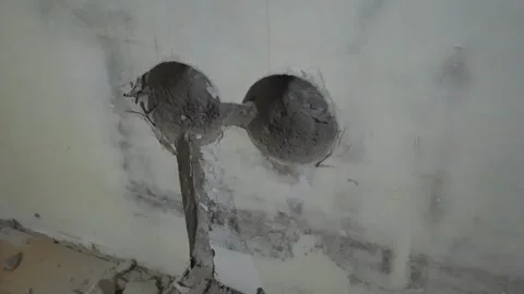 Electrical box holes drilling into concrete wall Stock Footage 346594059