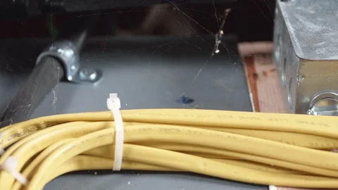 Electrical Boxes and Wires on Basement Wall CLOSE UP SLIDE RIGHT Stock-Footage 104874665