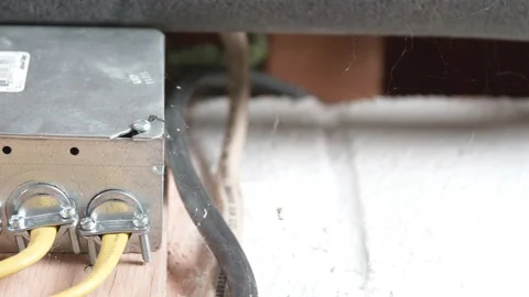 Electrical Boxes and Wires on Basement Wall CLOSE UP SLIDE LEFT Stock-Footage 104875123